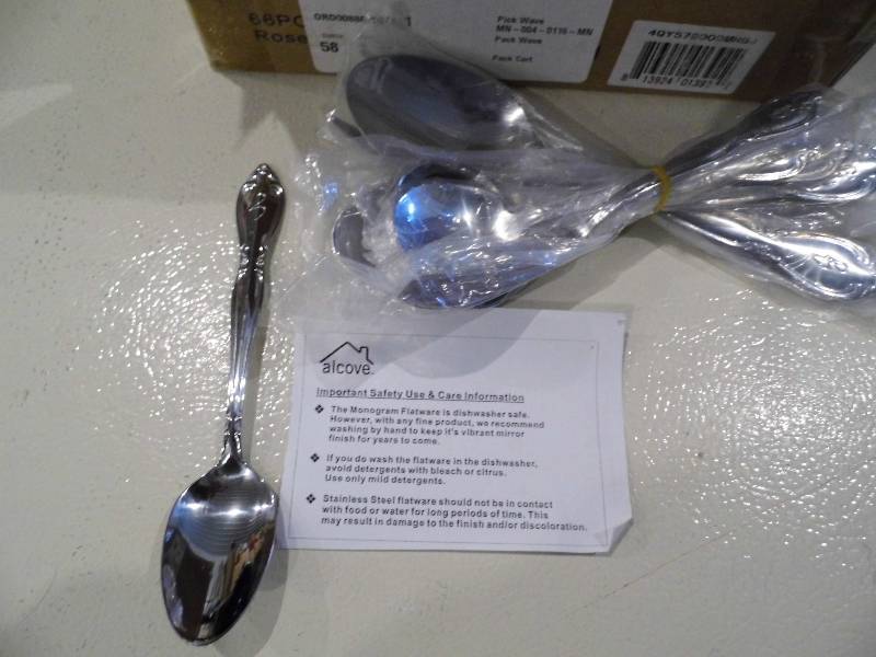 lot 95 image: Monogrammed Silverware Set
