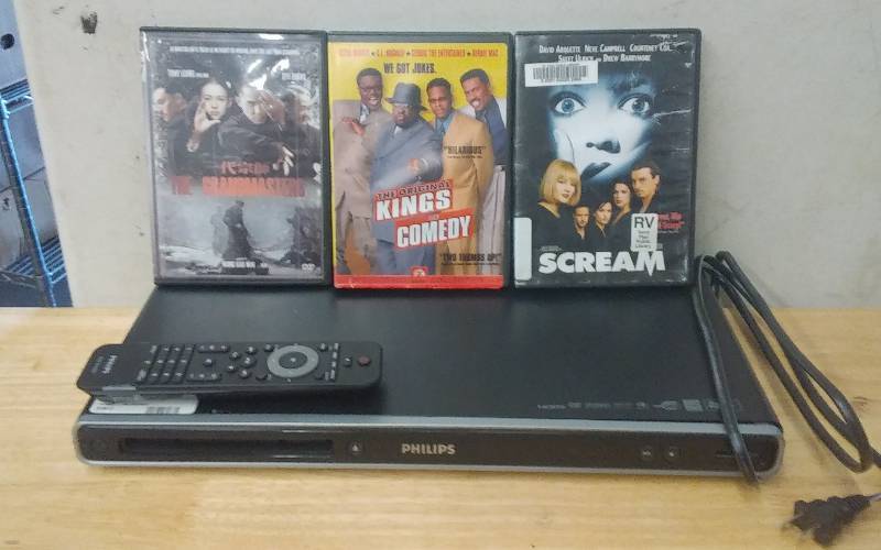 lot 48 image: Philips DVD Player With Remote, 3-DVDs