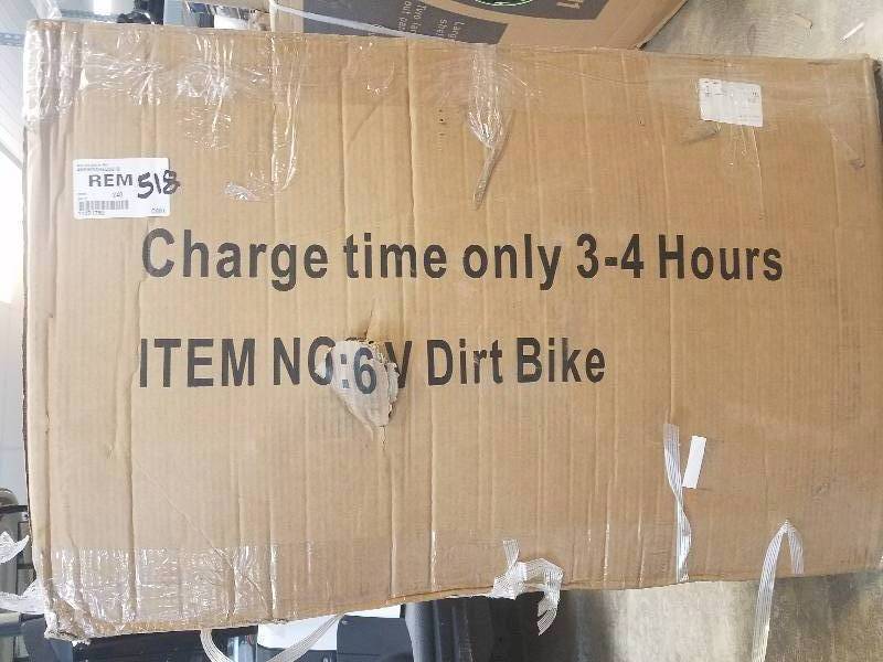lot 518 image: Mini Dirt Bike 6v Red