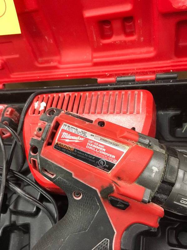 Milwaukee M12 Fuel 12-volt Litium-Ion Brushless Cordless 12 in. Hammer DrillDriver and Impact Combo Kit used in working condition