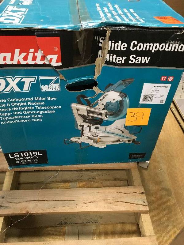 Makita 15 Amp 10 in. Dual Bevel Sliding Compound Miter Saw with Laser open box in like new condition