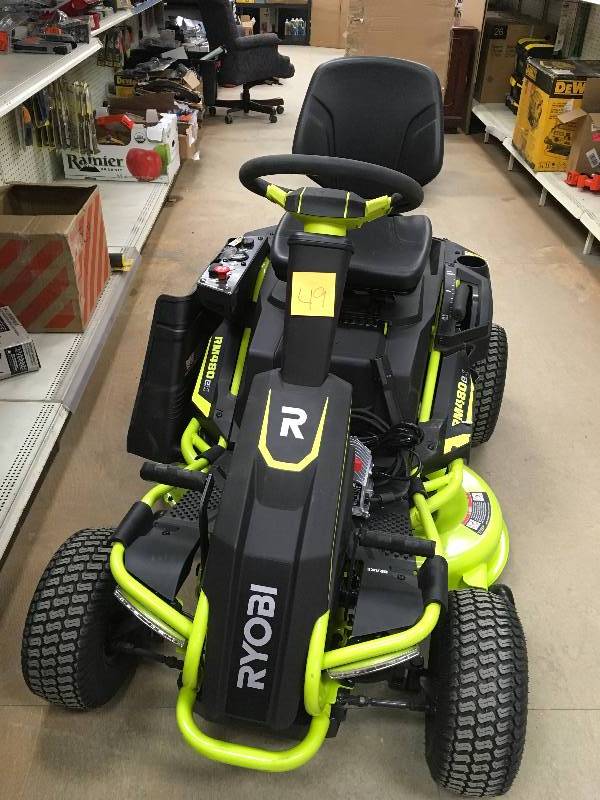 Ryobi 38 in. 100 Ah Battery Electric Rear Engine Riding Lawn Mower side plastic damaged display model not used