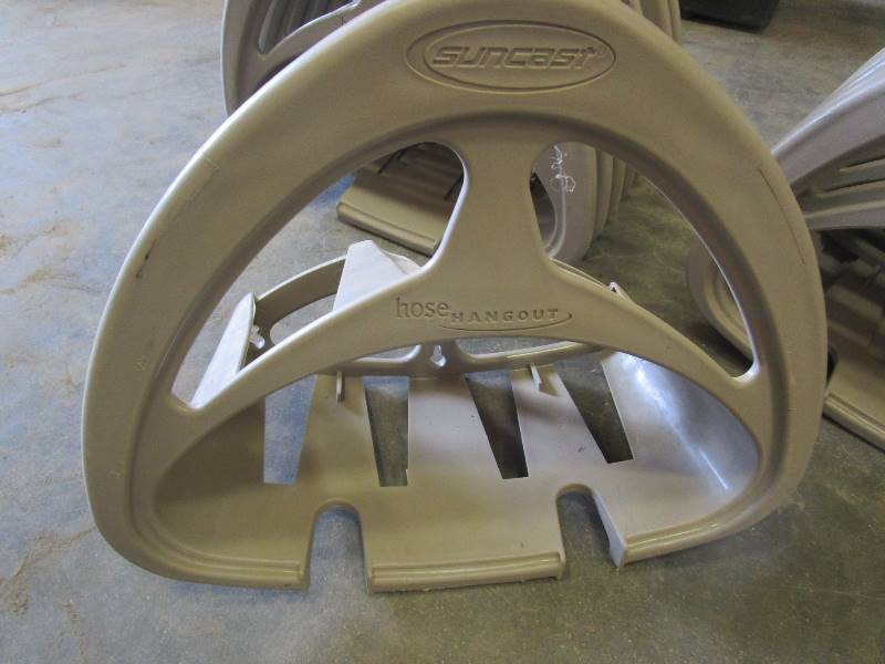 lot 78 image: (14) (New) Garden Hose Hangers