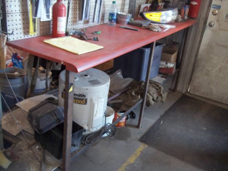 lot 64 image: Metal Shelving with Bench top and pegboard