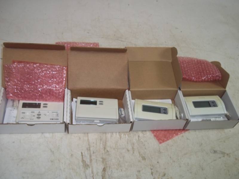 lot 15 image: Honeywell & Lux Programmable Thermostats