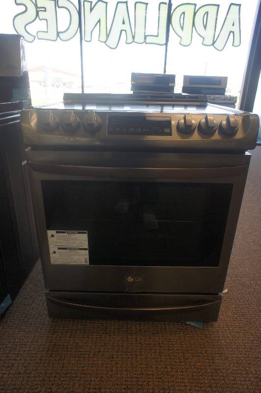 lot 4 image: NEW - SCRATCH AND DENT - LG ENERGY STAR MODEL # (LSE4613BD) - Slide-in Electric Convection Range - 6.3 cu ft - Black Stainless Steel - Stainless Steel - TESTED WORKS - MSRP $ 1699.99