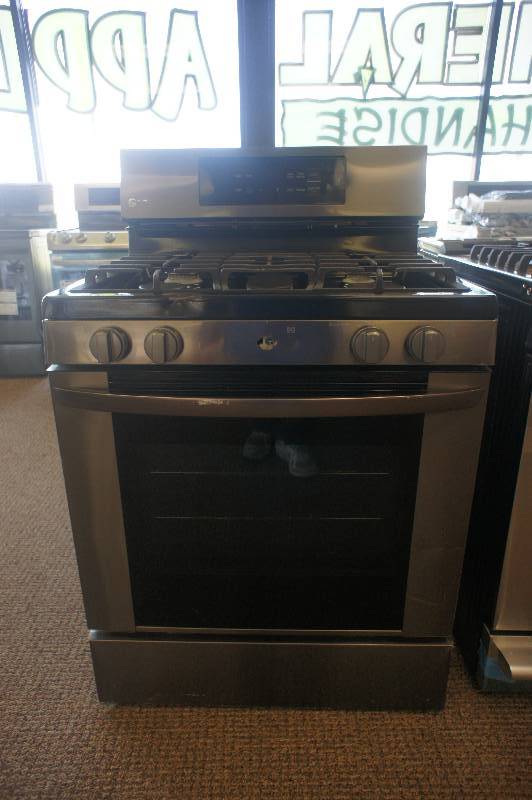 lot 5 image: NEW - SCRATCH AND DENT - LG ENERGY STAR MODEL # (LRG3061BD) - Gas Range - Freestanding - 5.4 cu ft - Black Stainless Steel - TESTED WORKS - MSRP $ 1099.99