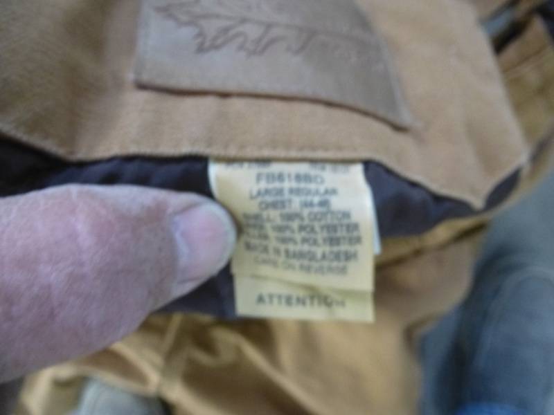 lot 92 image: Tote With Coveralls