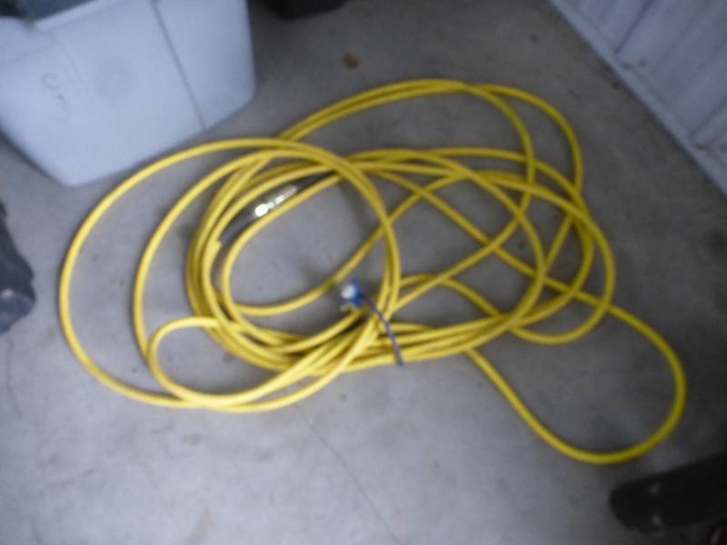 lot 104 image: Lawn Sprinkler, Air Hose & Gun Holster