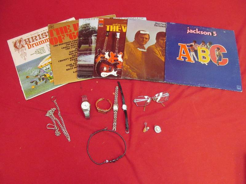 lot 34 image: jewelry, watches, record albums