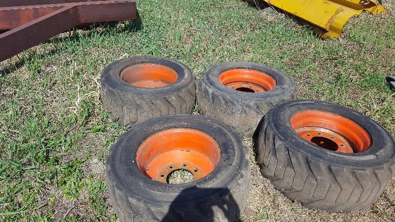 lot 24 image: Lot of (4) Bobcat Extra wide Floaters - Tires & Rims