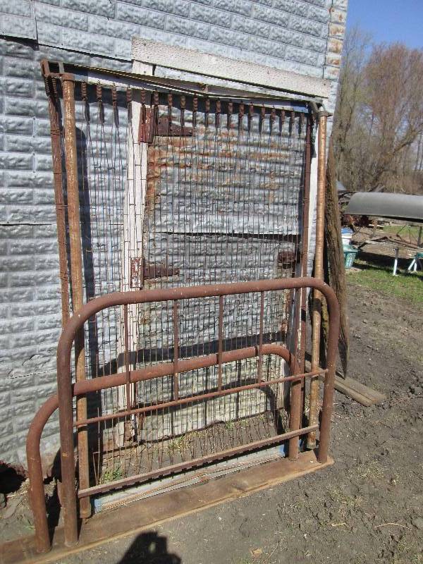 lot 15 image: metal bed and fence...