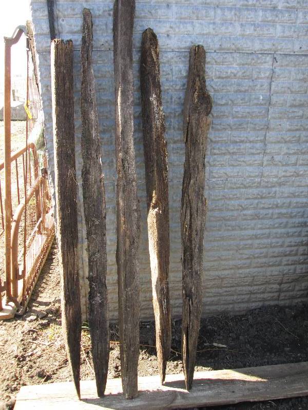 lot 16 image: 5 weathered fence posts...