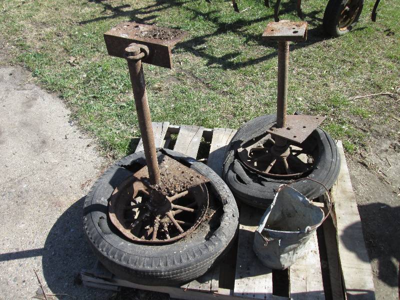 lot 24 image: 2 metal wheels and bucket...