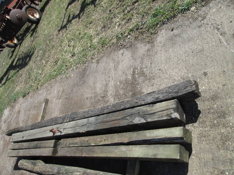 lot 29 image: 4 10 green treated beams...