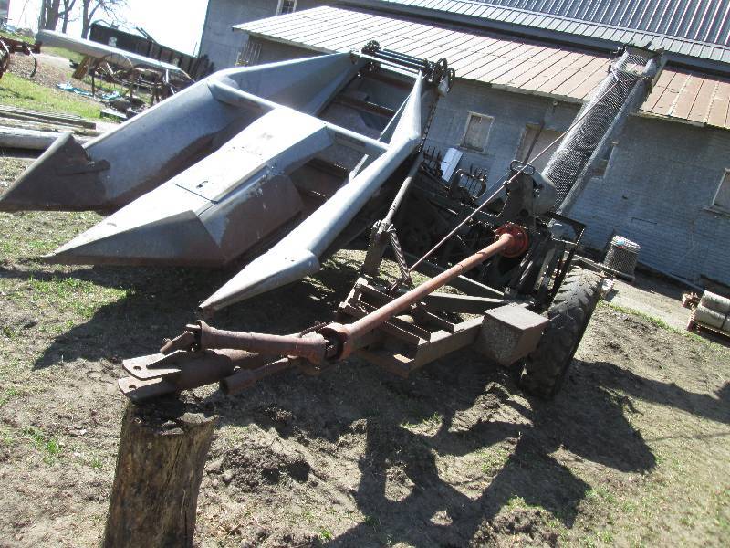 lot 31 image: galvanized 2 row corn picker...
