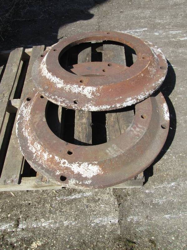 lot 61 image: 2 cast steel tractor weights outsid...