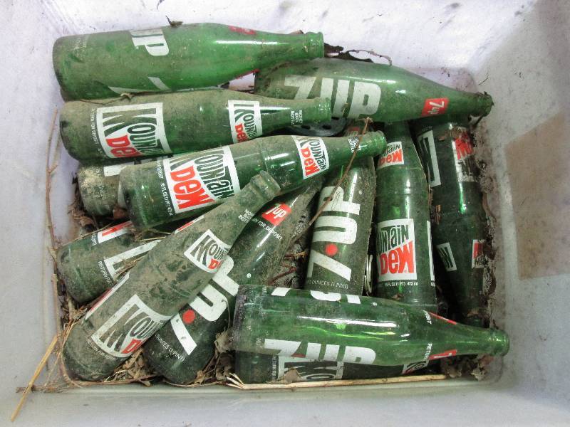 lot 127 image: tote of 7-up and Mountain Dew  bott...