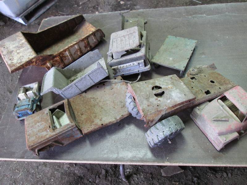 lot 128 image: vintage metal toy parts...