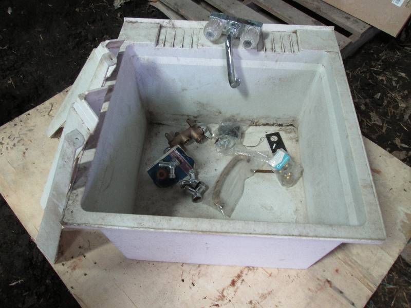 lot 164 image: laundry sink with faucets...