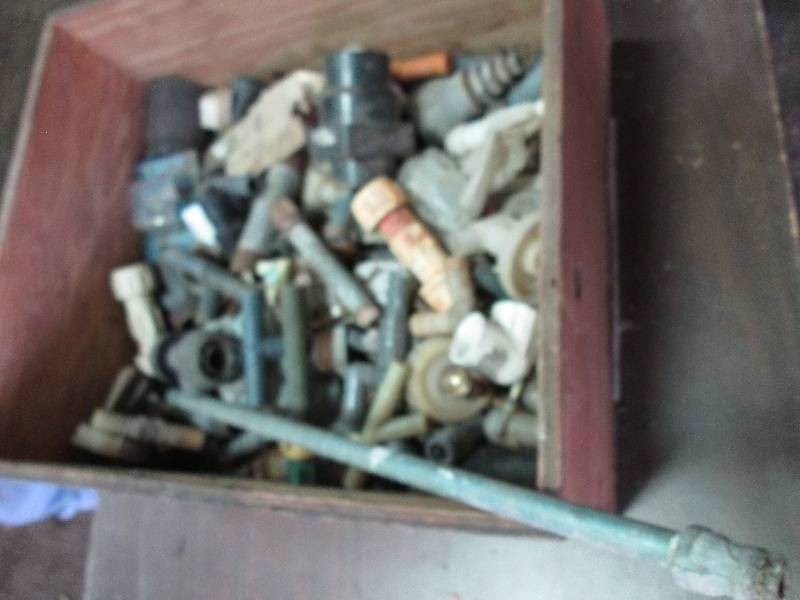 lot 172 image: plumbing supplies in wood box...