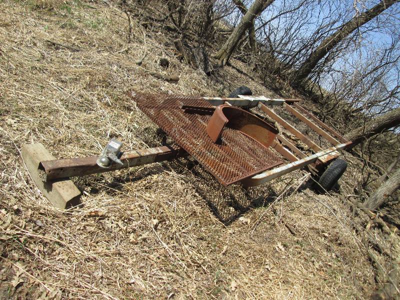 lot 179 image: iron trailer frame with extra metal...