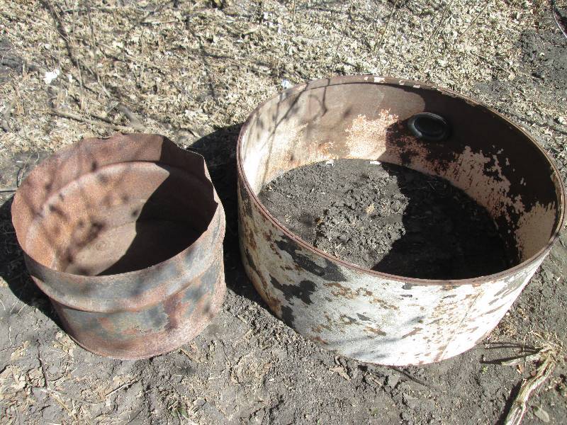 lot 194 image: half metal barrel and metal ring 42...
