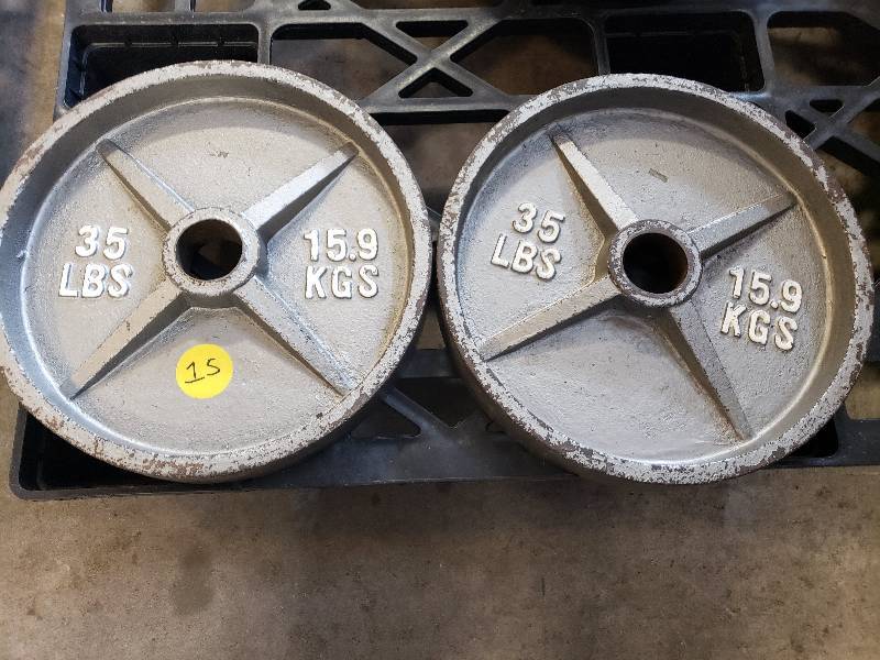 lot 15 image: 35lbs Olympic weight plates