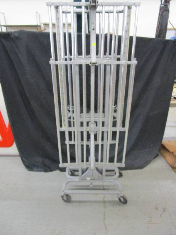 lot 156 image: Coat and Hat Rack Over 101 Long Folds up and On Rollers