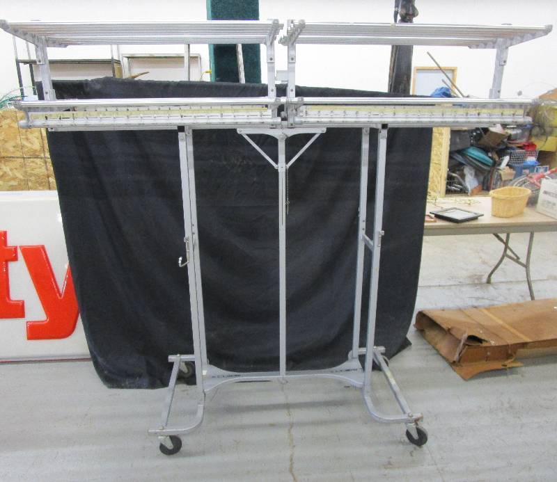 lot 157 image: Coat and Hat Rack Over 101 Long Folds up and On Rollers