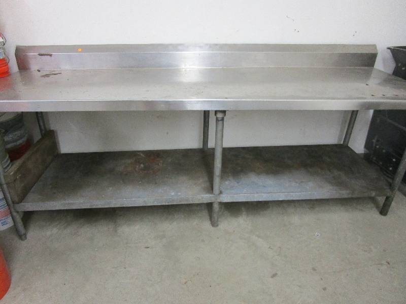 lot 23 image: Commercial Stainless Steel Kitchen Counter 8 Long x 30 Wide x 32 Tall