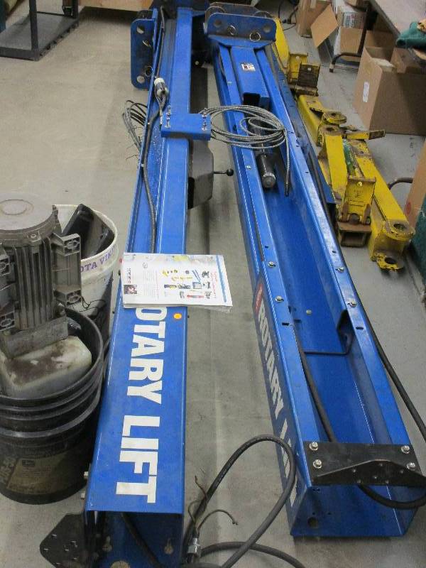 lot 45 image: Rotary Lift 10,000 Pounds Works and Disassenbles and Ready to Haul See Pictures