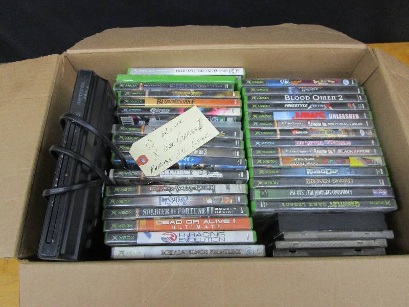 lot 57 image: DVD Player with 30 Original Xbox Games
