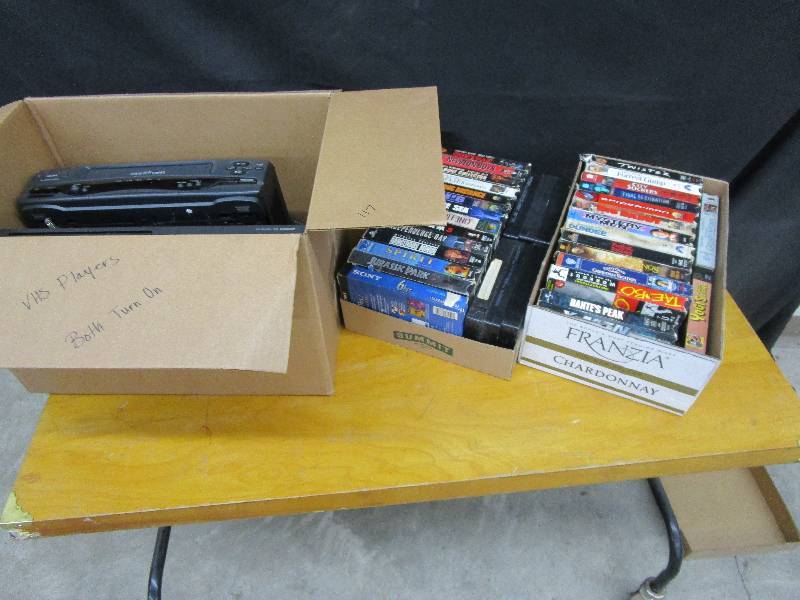lot 61 image: 2 Vhs Players and DVD and VHS Tapes