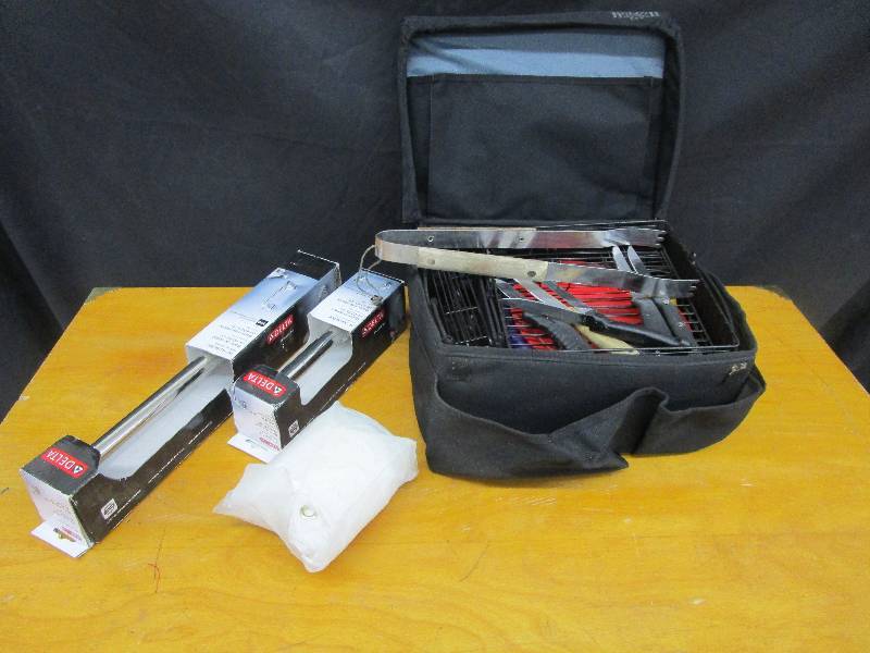 lot 70 image: Picnic and Camping Set with Silverware and Dishes and Handle Bars