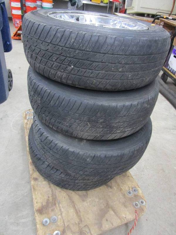 lot 80 image: 4-Versado LX Tires and Rims, 21565R17 99T See Pictures