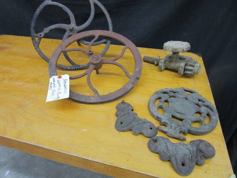 lot 87 image: Decorative Pully and Gear and Garland Stove part