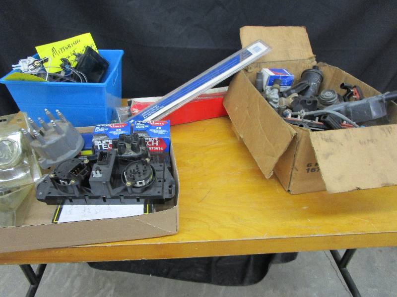 lot 95 image: New oil Filters, Oil Press gauge, Water Temp Gauge, Misc Parts, 3000 GT Door Lock Activators and Misc Fule seders,