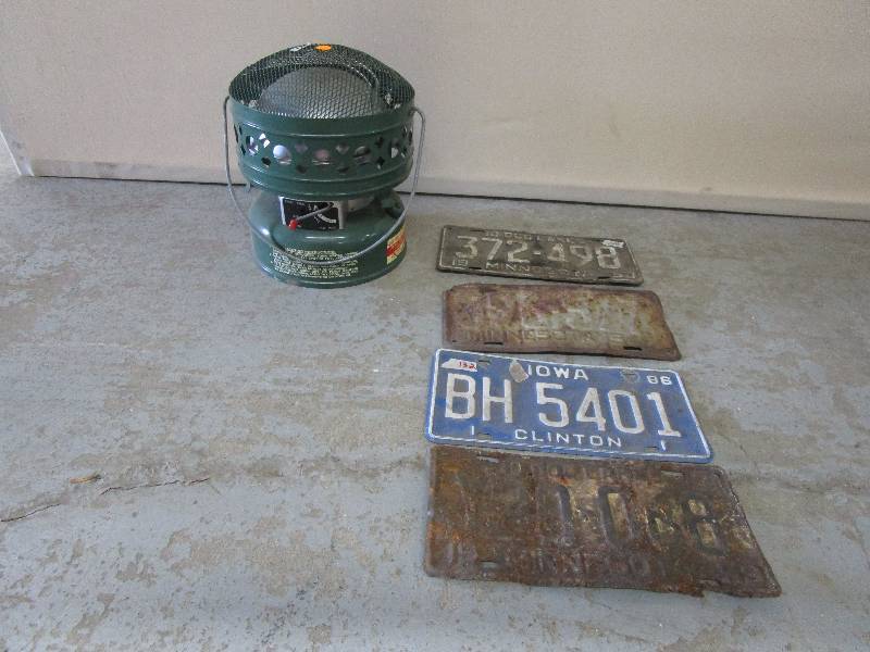 lot 122 image: Coleman Heater and Licence Plates 1953, 1945, 1986 and more
