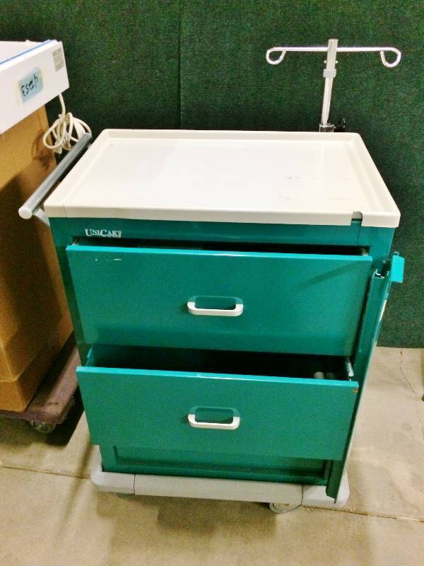 lot 9 image: Retails New $1200 - Excellent Condition Heavy Duty Mobile 3 Drawer Medical Crash Cart With IV Hook - Great For Garage At Cabin With Extra Board For Cleaning Fish - Can Be Locked Up For Storage Of Sharp Knives  Locking Wheels Too