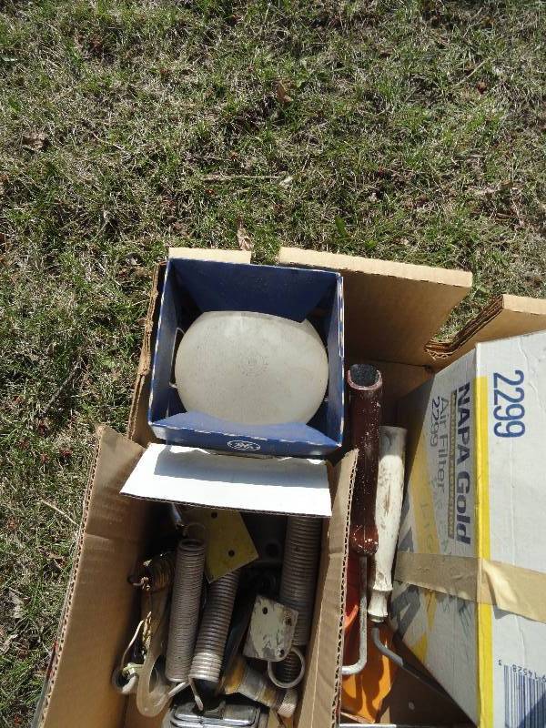 lot 611 image: Sylvania light bulbs, Self sealing inner tube, Springs, Paint Brushs