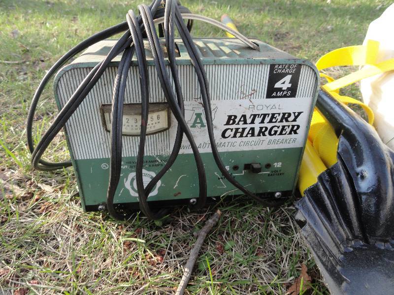 lot 633 image: Battery charger Works, Ash Shovel, Landing light plastic for Bellanca airplane, Broom handle