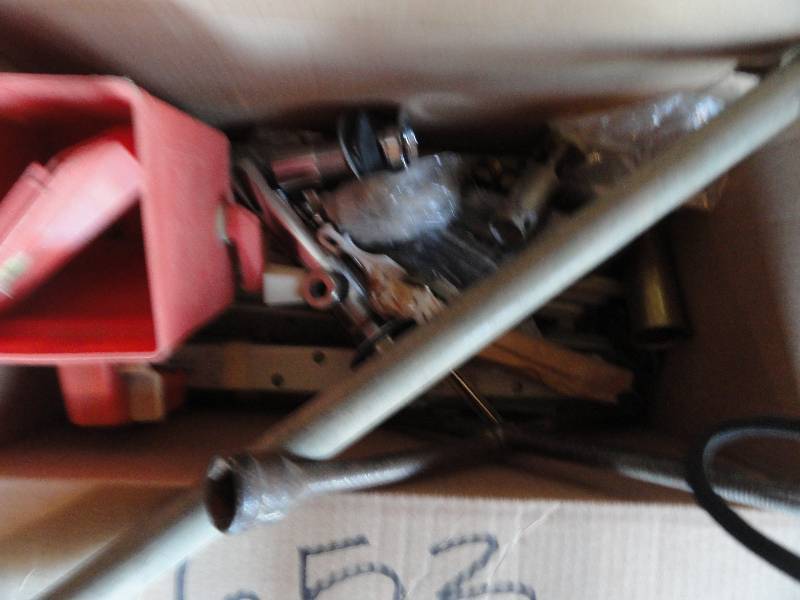 lot 653 image: Aluminum wing brackets for Bellanca, brass Fittings, Drain, Tire wrench, Steel pipe, Whirly bird spreader