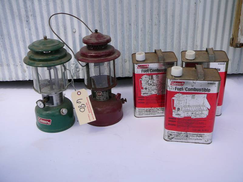 lot 680 image: Coleman Lantern, AGM Lantern model 2572 & 3 Coleman fuel cans