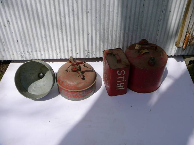 lot 682 image: Metal gas cans and Funnel