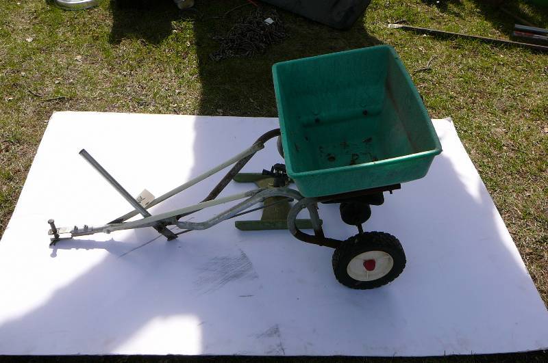 lot 703 image: Grass seeder and Sprinkler