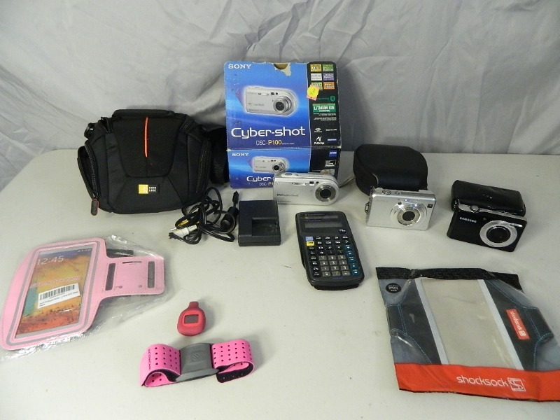 lot 148 image: Cameras, FitBit, and More