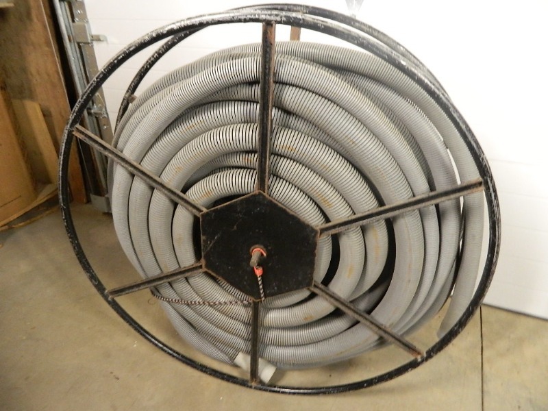 lot 26 image: Large Spool of Plastic Hose