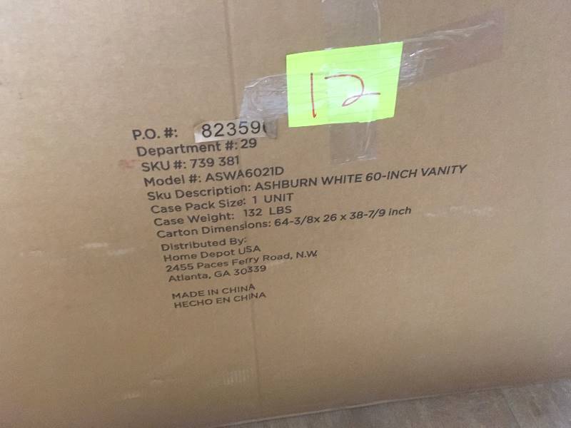 lot 12 image: Foremost Ashburn 60 in. W x 21.75 in. D Vanity Cabinet in White  open box not used