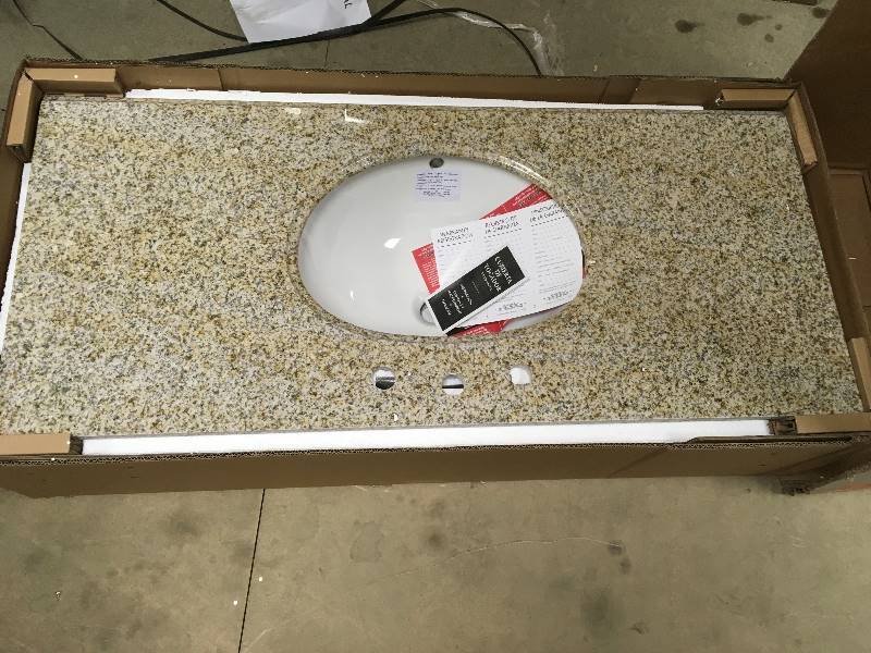 lot 53 image: Pegasus 49 in. W Granite Vanity Top in Beige with White Basin open box not used